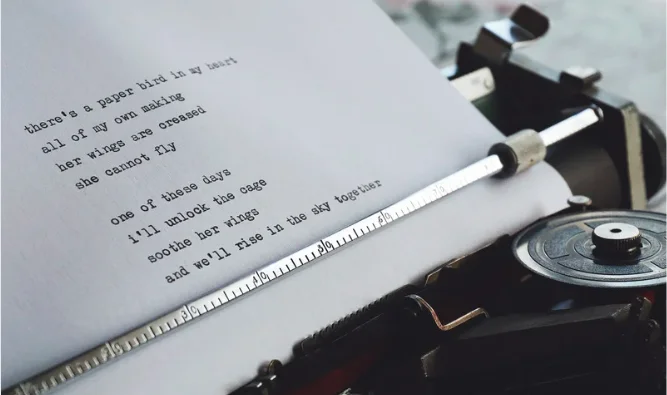 A poem on paper in a typewriter
