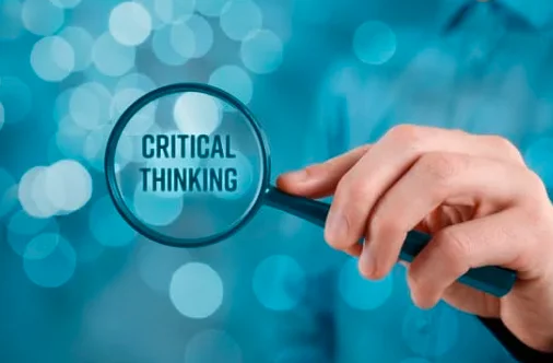 A magnifying glass highlighting critical thinking